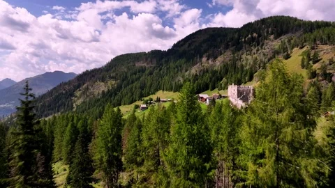 Drone flying above the dolomites during a sunset Video stock 263267765