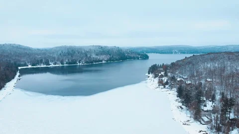 Drone flying above Eagle Lake, Ontario, Canada Stock Footage 99989859