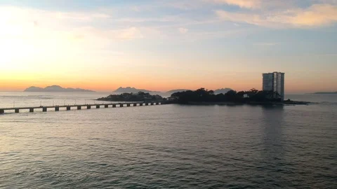 Drone flying above the ocean in Vigo, Spain rotating until the Toralla Island Stock Footage 122467992