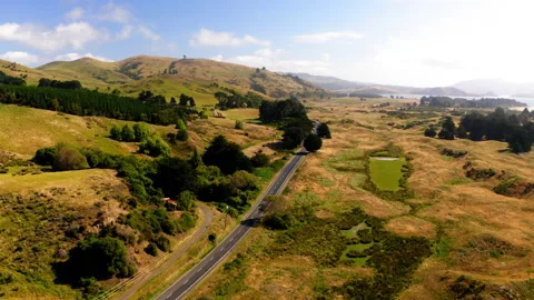 Drone Flying Above A Road Going Through New Zealand's Beautiful South Island Stock Footage 234647977