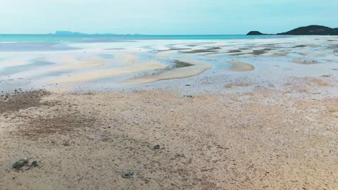 Drone Flying Above Tropical Low Tide Sandbars and Shallow Lagoon Stock Footage 340877582