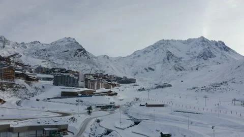 Drone flying above val thorens in winter skiresort close because of covid 19 Stock Footage 145699694