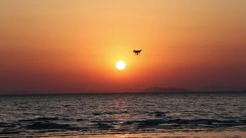 Drone flying against sunset sky Stock Footage 75245663