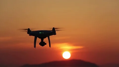 Drone flying in air and sunset sky Stock Footage 76457642
