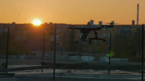 A drone flying of in the air in sunset slow motion Stock Footage 57348162