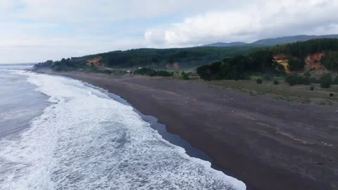 A drone flying along the Chilean coast, Buchupureo, Cobquecura, Chile Stock Footage 345700132