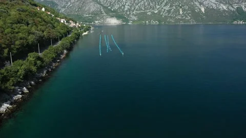 Drone flying along the coast over the oyster farm Stock Footage 164766484