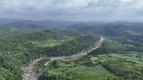 Drone flying along dry river in Ea So National Park, Dak Lak 動画素材 337398128
