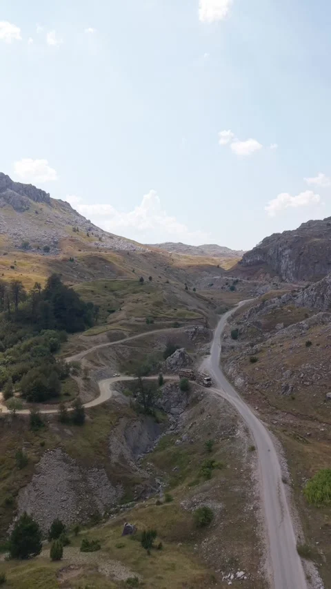 Drone Flying Along Mountain Road and Ascending Over Visocica Landscape, Bosnia Stock-Footage 342938888