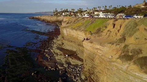 Drone flying along ocean cliffs 스톡 동영상 71151423