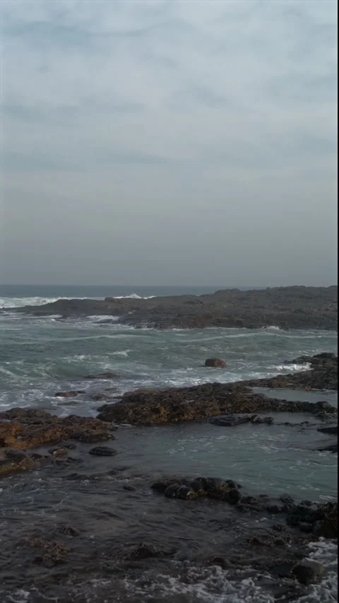 Drone Flying Along Wild Coast Beach Toward Rocky Shoreline, South Africa.ve.. Stock Footage 341430431