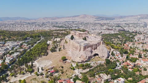 Drone flying around the ancient Parthenon temple at the Acropolis of Athens Stock Footage 345409942