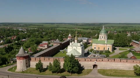 Drone flying around historic monastery with towers Stock Footage 332095030