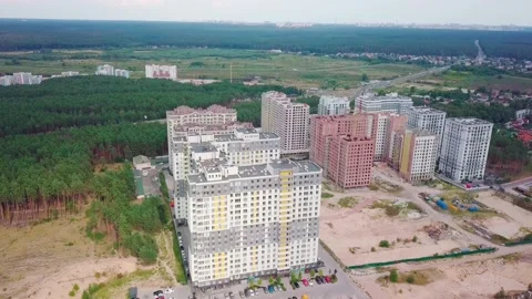 Drone flying around a housing complex, construction site. Building from the sky Stock Footage 159442120