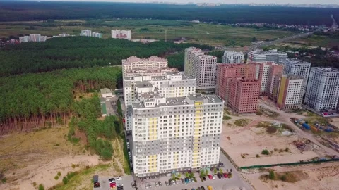Drone flying around a housing complex, construction site. Building from the sky Stock Footage 159442215