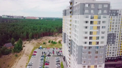 Drone flying around a housing complex, construction site. Building from the sky Stock Footage 159442459