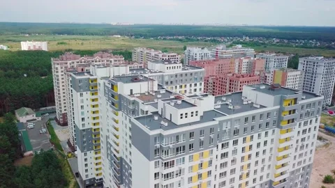 Drone flying around a housing complex, construction site. Building from the sky Stock Footage 159442869