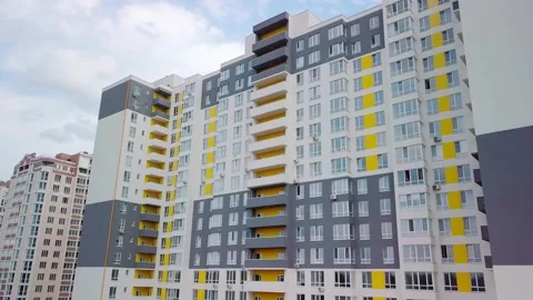 Drone flying around a housing complex, construction site. Building from the sky Stock Footage 159442909