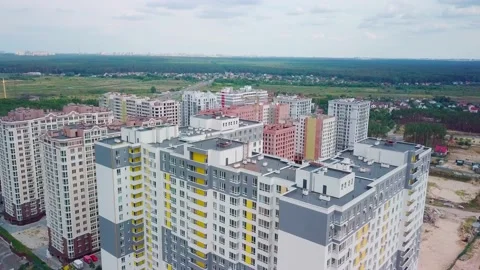 Drone flying around a housing complex, construction site. Building from the sky Stock Footage 159442979