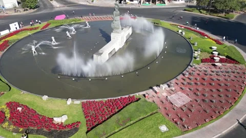 Drone flying around La Minerva fountain and monument roundabout in Guadalajara Stock Footage 314019150