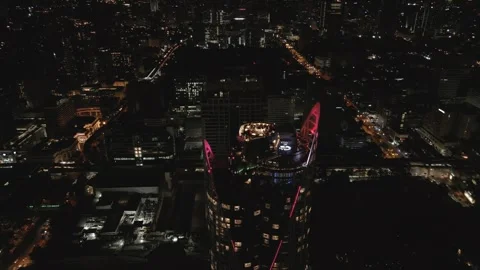 Drone Flying Around Modern Skyscraper at Night in Bangkok, Thailand Stock-Footage 331339384