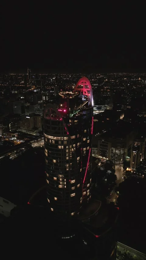 Drone Flying Around Modern Skyscraper at Night in Bangkok, Thailand Stock-Footage 331339447