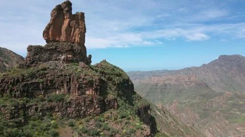 Drone flying around the Roque delMulato monolith in the stunning Tejeda Basin Vídeos de archivo 339079944