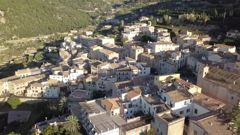Drone flying around small spanish town of Banyalbufar in mallorca Stock Footage 101427934