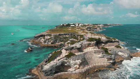 Drone flying away cliff beach. Beautiful coastline with waves. Bird view Stock Footage 169980144