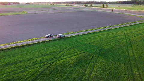 Drone flying away on the field Stock Footage 276530012