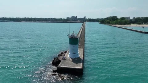 Drone Flying Away from Lighthouse on Lake Michigan Stock Footage 320742310