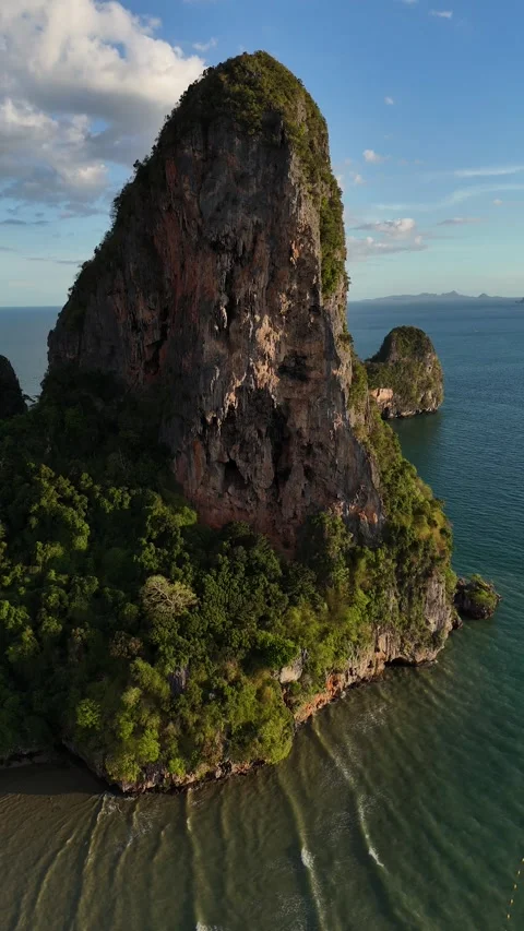 Drone Flying Away from Tropical Limestone Cliff in Ao Nang, Krabi, Thailand Stock Footage 335961393