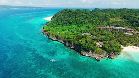 Drone Flying Back Over Boracay Cliff Coast with Local Boat and Tourists 動画素材 331463985