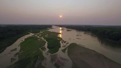 Drone Flying Backward Fast Over River To Field Stock Footage 78886257