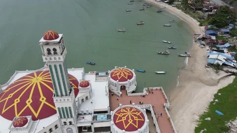 Drone flying backward from the mosque in Tanjung Bungah Stock Footage 150197226