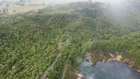 Drone Flying Backward Over Inferno Crater and Frying Pan Lake, New Zealand Stock Footage 317469830
