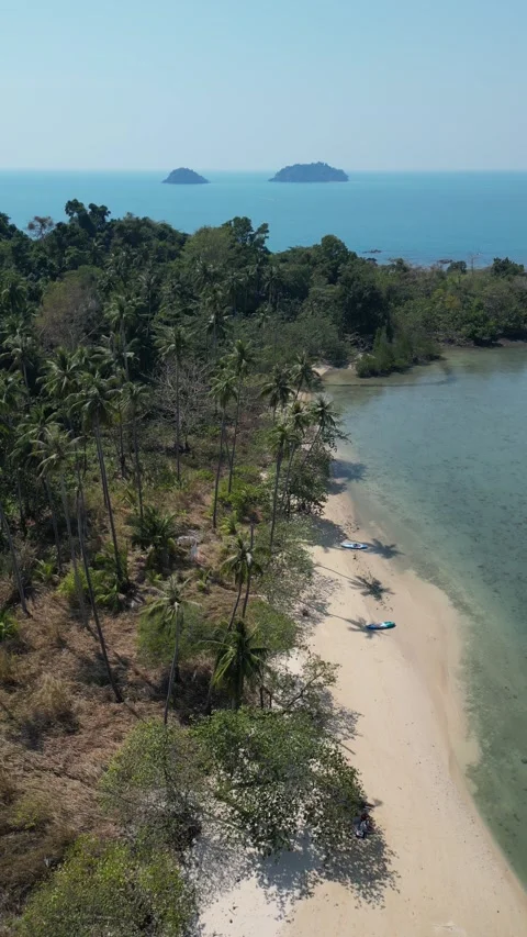 Drone Flying Backward Over Tropical Island Beach in Ko Chang, Thailand Stock Footage 335572232