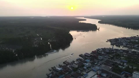 Drone flying backward from sunset in Kuala Sepetang, Perak. Stock Footage 152563454