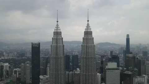 Drone flying backward from Twin Tower in Kuala Lumpur Stock Footage 150290082