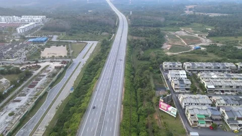Drone flying backward with view of LEKAS Highway and Housing area in Pajam Stock Footage 149280300