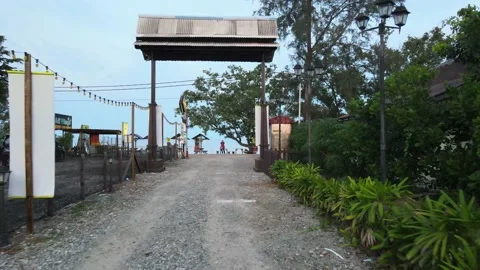 Drone flying backwards from Entrance gate Stock Footage 149630668
