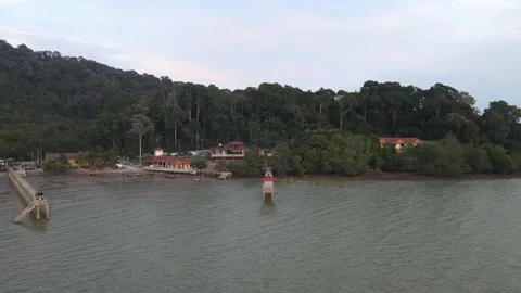 Drone flying backwards from jetty in Pasir Panjang, Negeri Sembilan Stock Footage 150723162