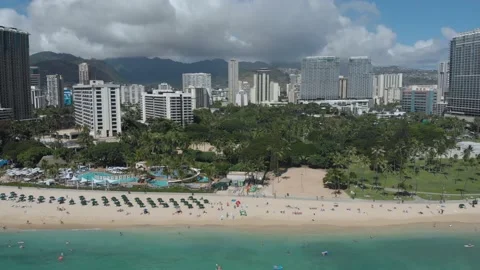 Drone Flying Backwards Over Fort DeRussy Beach in Waikiki, Honolulu, Hawaii Stock Footage 154167725