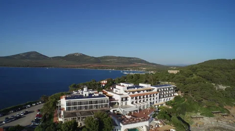 Drone flying backwards over peninsula with lighthouse Vídeo Stock 59832295