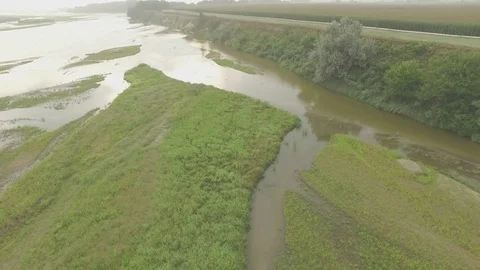 Drone Flying Backwards Over River From Cliff Raw Stock Footage 78887191