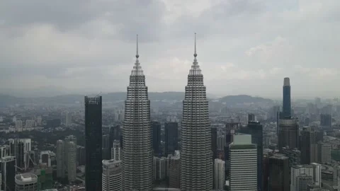 Drone flying backwards from Petronas Twin Tower Stock Footage 150289535