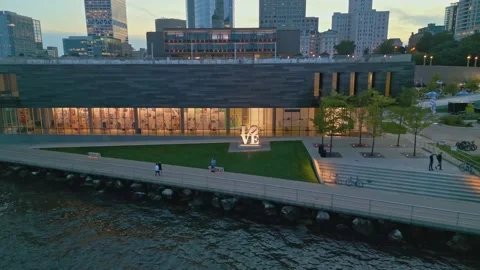 Drone Flying Backwards From War Memorial Revealing Milwaukee Skyline Blue Hour Stock Footage 220469511