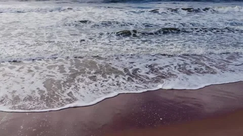 Drone flying from beach to the ocean. Imbassaí, Bahia, Brazil. Vídeo Stock 131928230