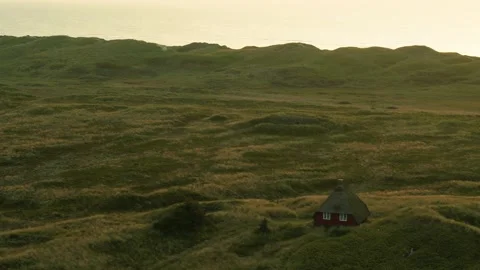 Drone flying by beautiful old thatched roof summer house on the Danish west.. Stock Footage 272293172