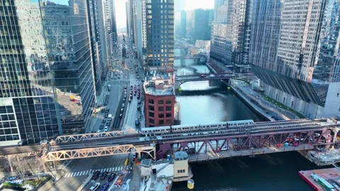 Drone Flying Between Downtown Chicago River Skyscrapers, Sunny Day in Loop 4K Stock Footage 327820008